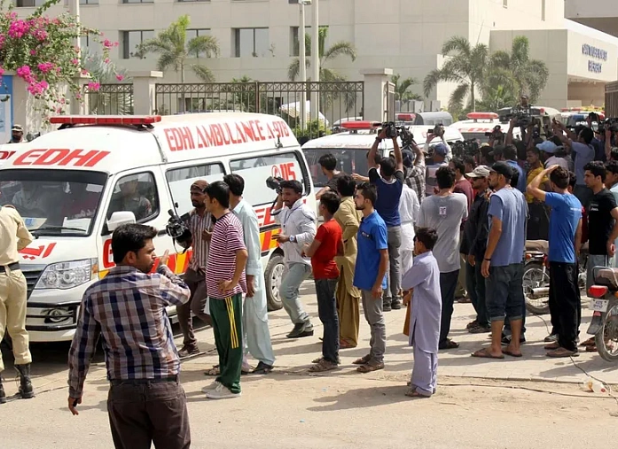 Two explosions took place in Pakistan on the eve of elections, killing 28 people