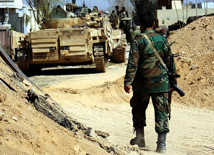 Four Syrian soldiers injured in militant attacks